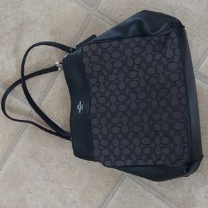 Like new black and silver signature COACH purse